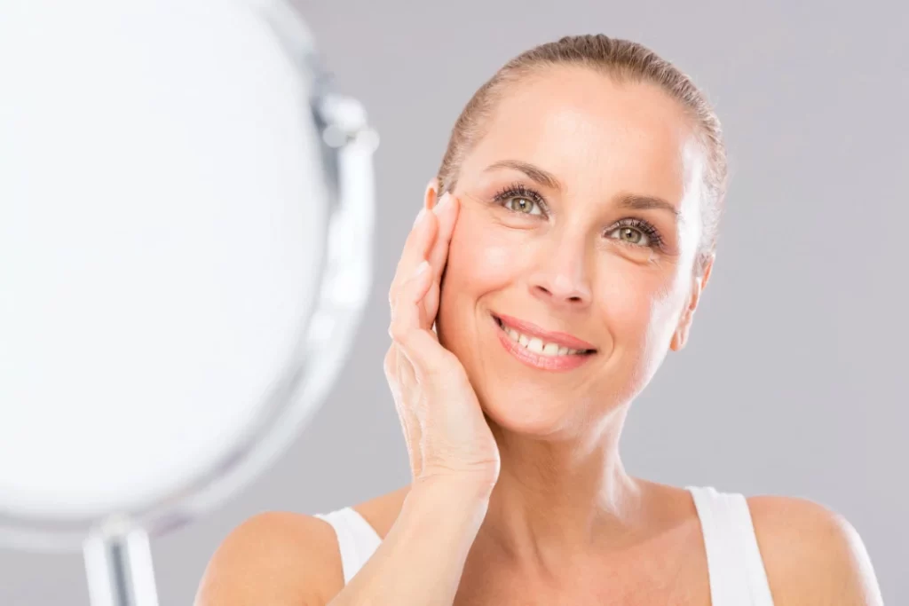 Woman looking attractive in front of mirror.