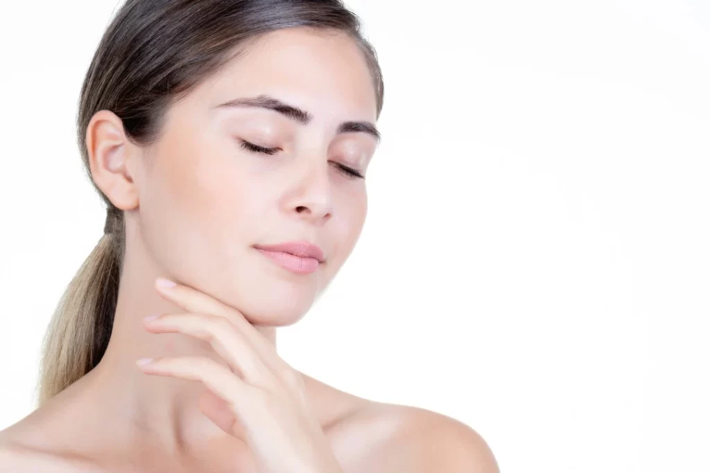 Young posing after using anti aging cream.