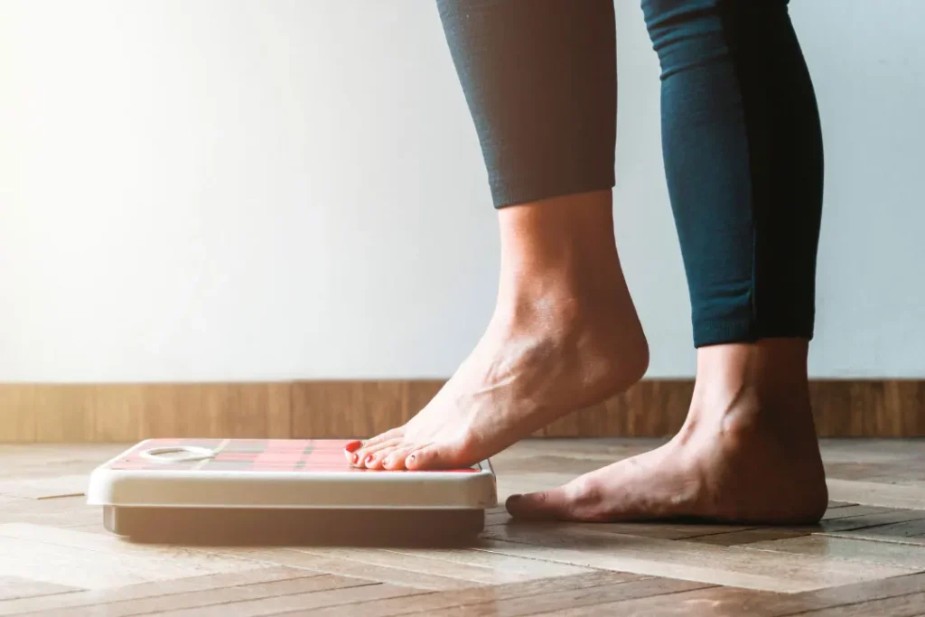 woman checking his weight