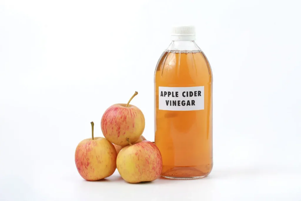 A bottle of apple cider vinegar.