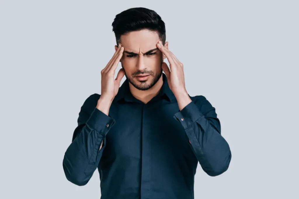 A man facing headache.