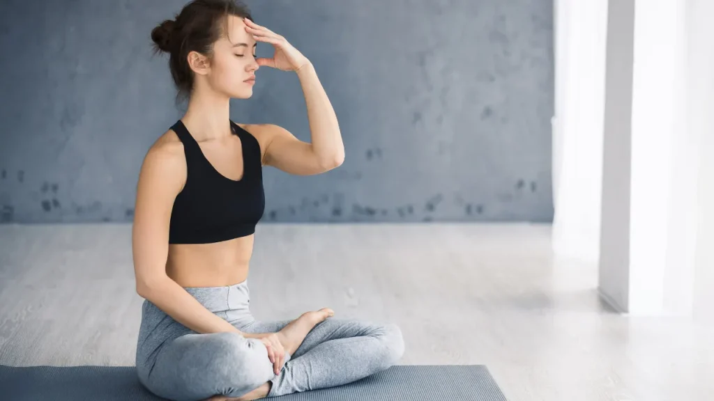 Young girl doing yoga.