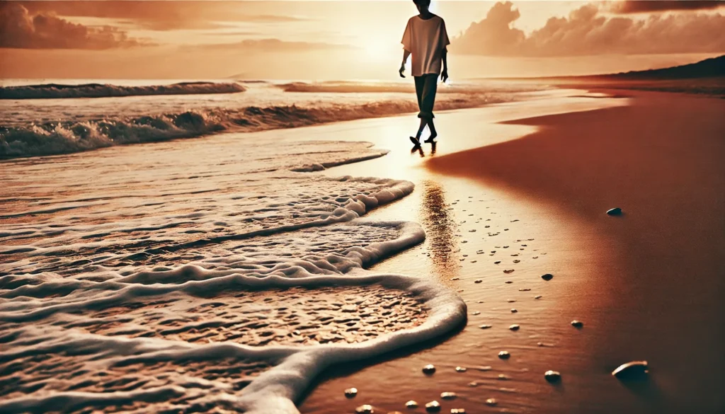 A peaceful scene of a person walking barefoot along the shoreline as gentle waves touch their feet, illustrating sensory engagement as a grounding method.